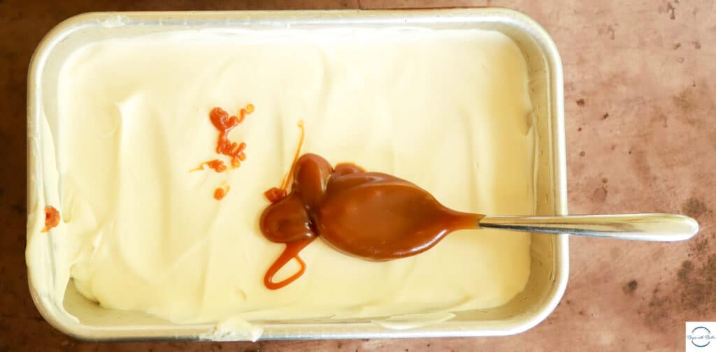 salted caramel sauce on top of ice cream.