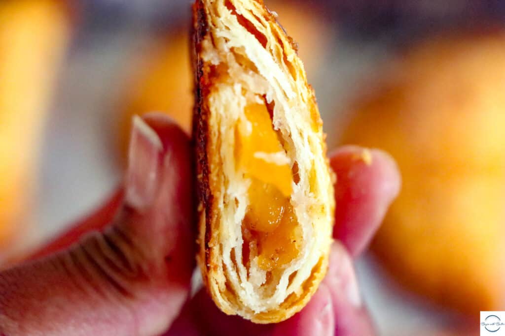 This is a picture of a cross-section of a peach hand pie.