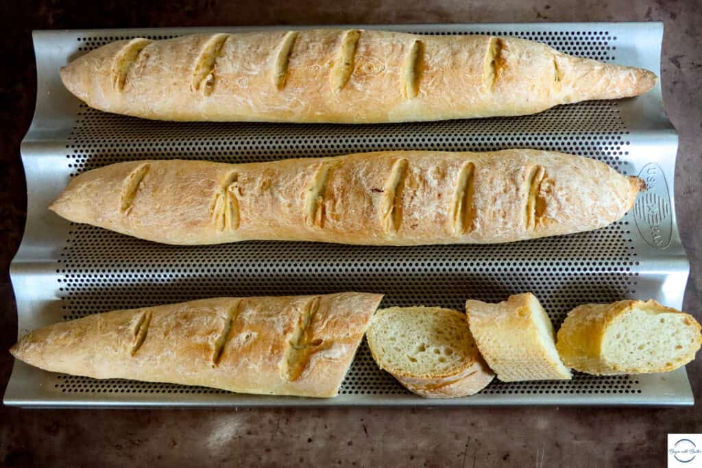 This is a picture of three baguette loaves.