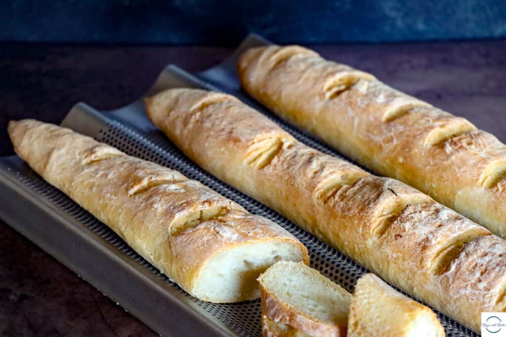 This is a picture of three baguette loaves.