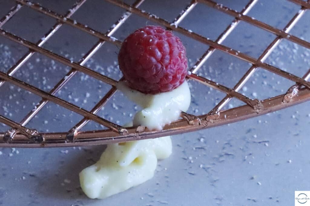 This is a photo of a raspberry and pastry cream.