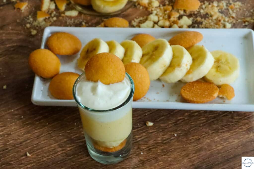 This is a photo of banana pudding in a shot glass