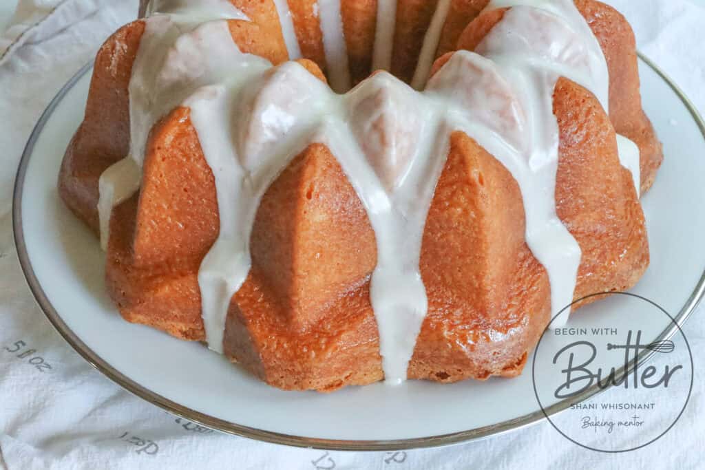 This is a photo of the Best Vanilla Glaze on a Vanilla Pound Cake.